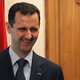 Illustration for article titled Bashar Al-Assad Shares Laugh With Military Leaders Over Time He Once Wanted To Be A Doctor And Help People